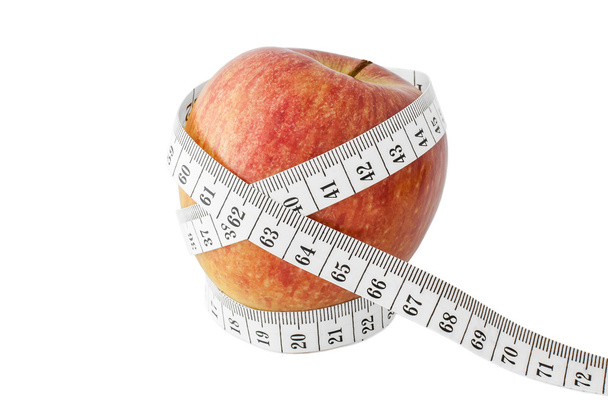 Яблуко і вимірювальна стрічка
 - Фото, зображення