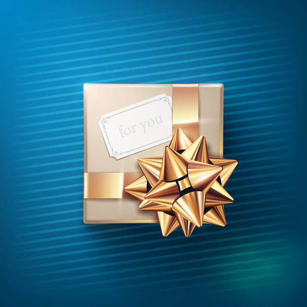 The beige gift box with the white greeting card and glittering golden bow with ribbons isolated on blue background. Vector realistic decoration element for holiday design. Top view - Vektor, Bild