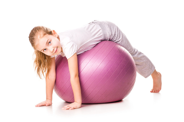 Sportive girl on a fit ball - Photo, image