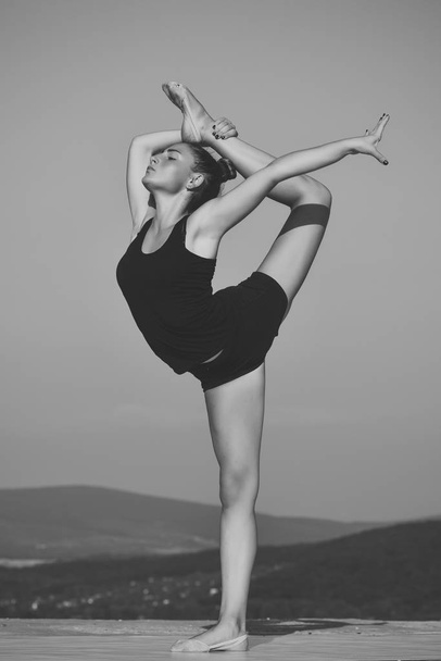 Gymnastic school and energy. Flexibility in acrobatics and fitness health. - Zdjęcie, obraz