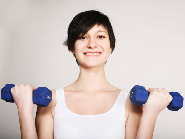 fitness woman with dumbbells. - Foto, Imagem
