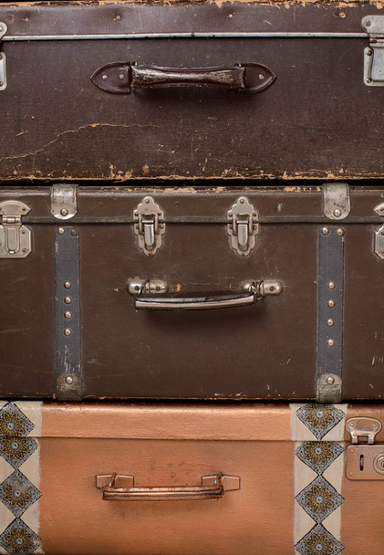 stack of retro shabby suitcases closeup - Photo, Image