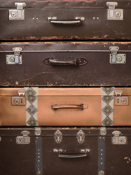 pile of retro shabby suitcases - Fotó, kép