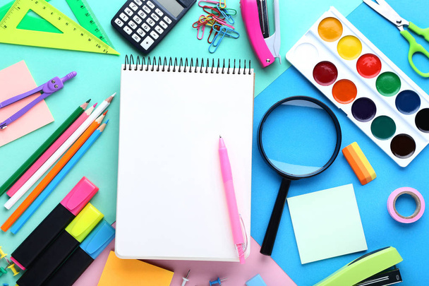 School supplies with blank sheet of paper on colorful background - Zdjęcie, obraz