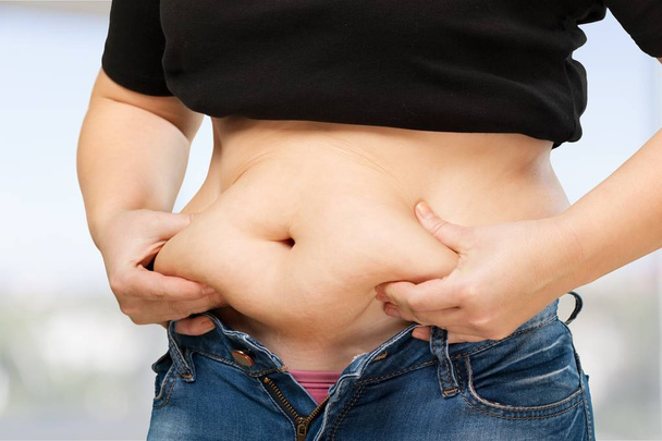 close-up view of Woman with fat belly - Foto, Imagem