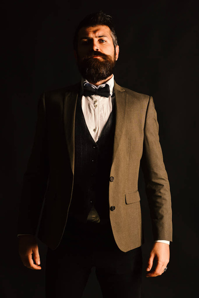 Business and vintage style concept. Manager or speaker with stylish beard and moustache. - Valokuva, kuva