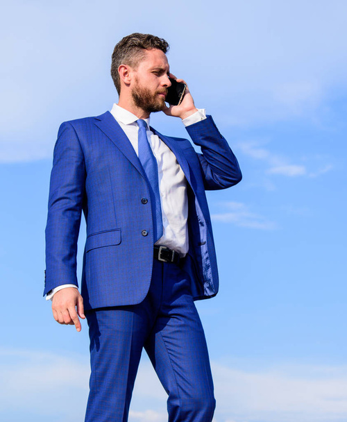 Entrepreneur control business remotely by phone call outdoors. Asking for assistance. Businessman call smartphone delegation of tasks. Establish control identify limits to work and provide delegation - Zdjęcie, obraz