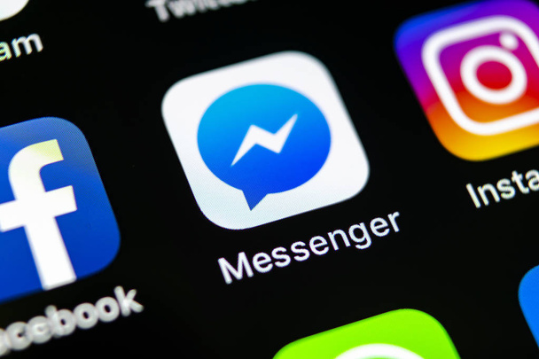 Sankt-Petersburg, Russia, May 10, 2018: Facebook messenger application icon on Apple iPhone X screen close-up. Facebook messenger app icon. Online internet social media network. Social media app - Foto, imagen
