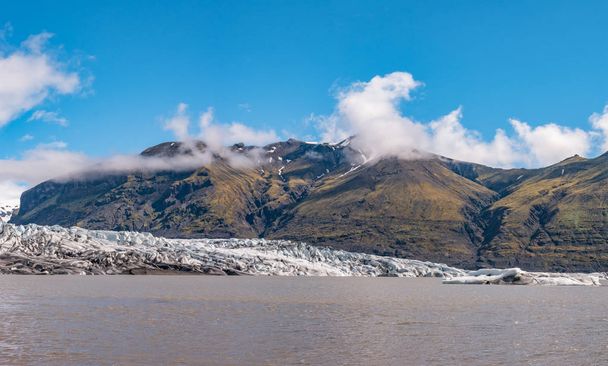 Wonderful and big Skaftafellsjokull glacier near Skaftafell on South Iceland, summer time - Φωτογραφία, εικόνα