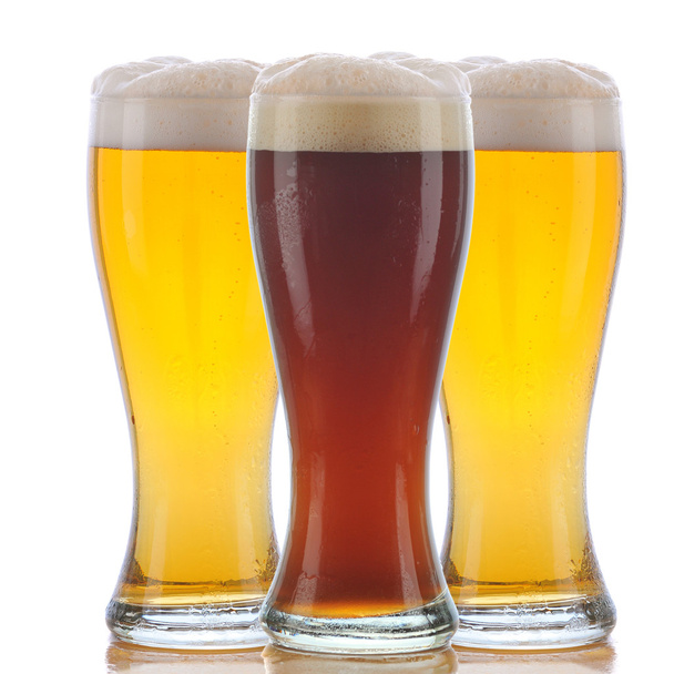 Glass of Dark Ale and Two Pale Ales - Foto, imagen