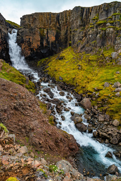 Wonderful and high waterfall Fardagafoss near Egilsstadir on Eastern Iceland, summer time - Foto, imagen