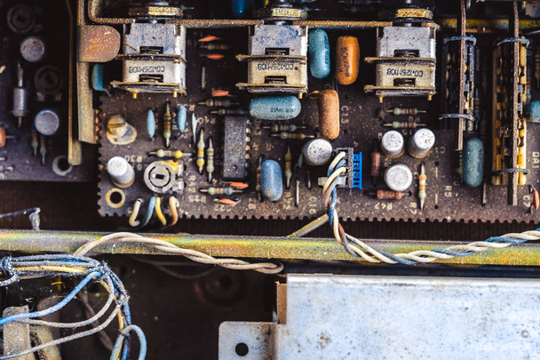 Microchips in old circuit board printed circuit board. - Foto, Bild