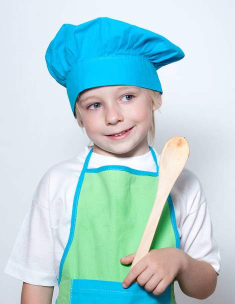 Child as a chef cook - 写真・画像
