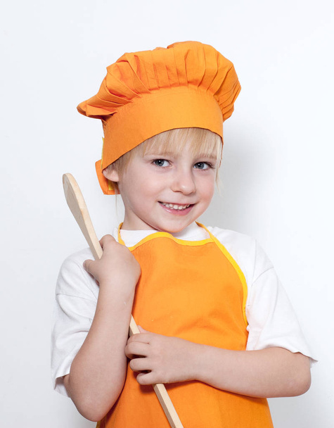 Child as a chef cook - Foto, imagen