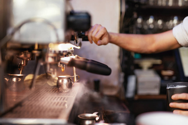 Preparing Drink In Coffee Machine By Barista At Cafe - 写真・画像