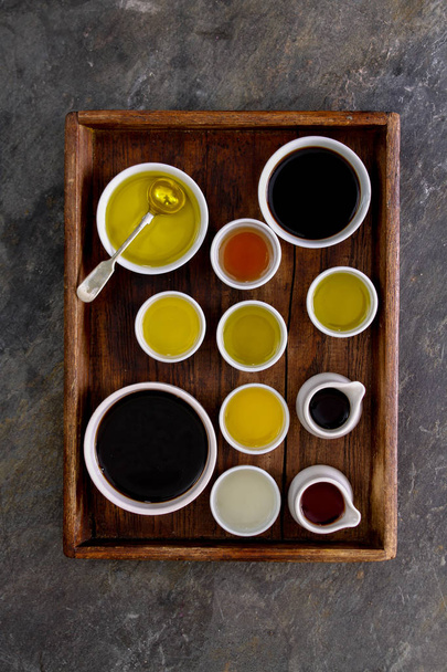 oil selection in dishes - Foto, Bild