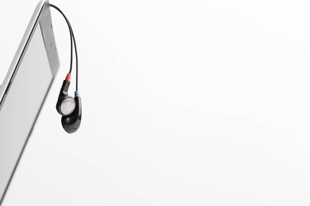 Music concept - Headphones over laptop - Foto, Imagem