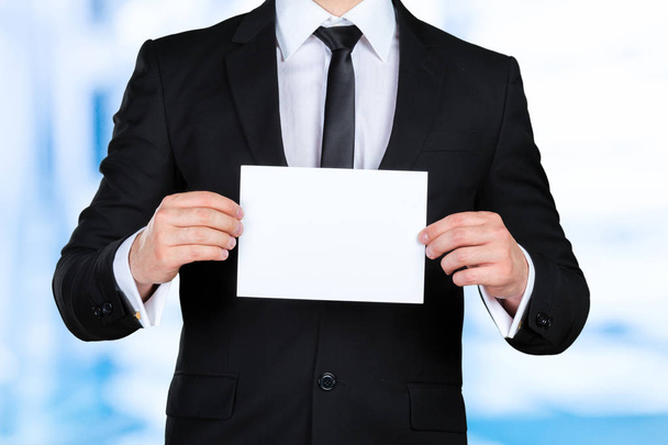 Businessman showing his business card - Zdjęcie, obraz