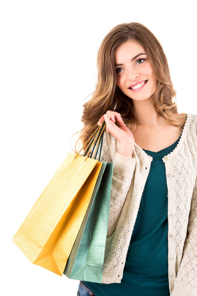 Beautiful woman holding shopping bags - Foto, Imagen