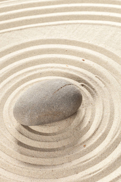 zen meditation stone on sandy background - Zdjęcie, obraz