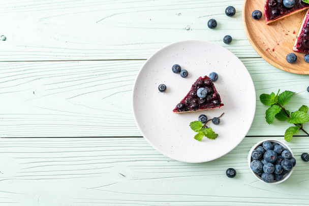 homemade blueberry cheese cake on wood background - Foto, immagini