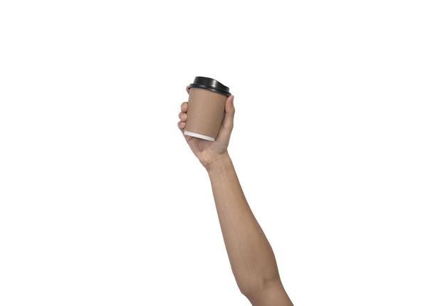 Рука держит кофейную чашку. макет для креативного брендинга
. - Фото, изображение