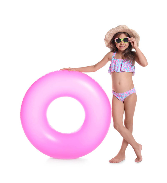Cute little girl with inflatable ring on white background - Fotoğraf, Görsel