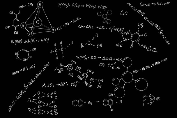 Modelos y fórmulas moleculares sobre fondo pizarra
  - Foto, imagen