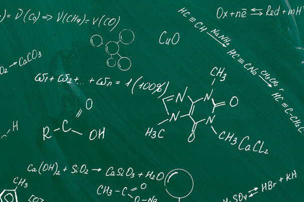 Molecule models and formulas on board background - Photo, Image