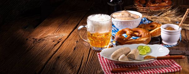 delicious bavarian oktoberfest white sausage with sweet mustard - 写真・画像
