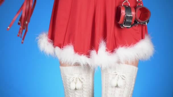 seductive santa girl with sex toys in seductive poses. on a blue background. a close-up. Slow motion. 4k - Video