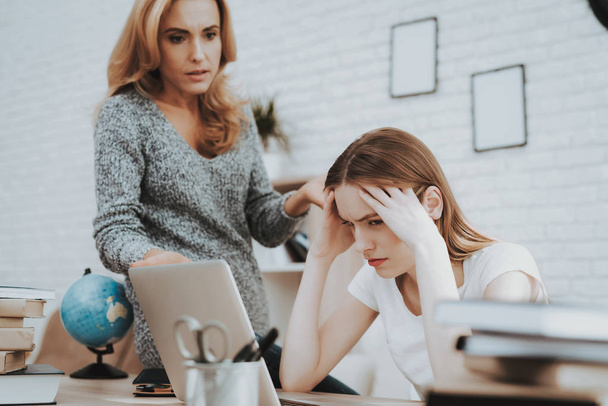 Angry Mother Motivate Daughter to do Homework. Daughter with Laptop. Mother and Daughter at Home. Teenage Girl. Education at Home Concept. Women Using Digital Device. Studying Girl. - Zdjęcie, obraz