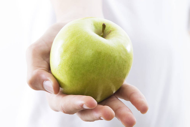 hands with natural green apple - Foto, Imagem