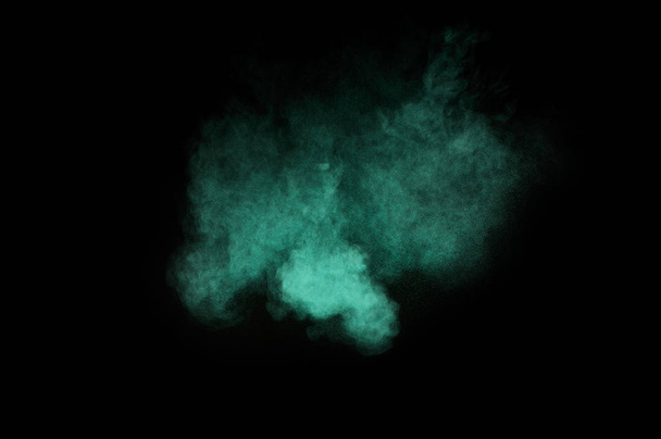 Aquamarine powder explosion on black background. Colored powder cloud. Colorful dust explode. Paint  Holi. - Photo, Image