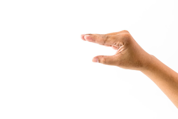 L'homme montre l'index de sa main isolé sur fond blanc, symbole du doigt
. - Photo, image