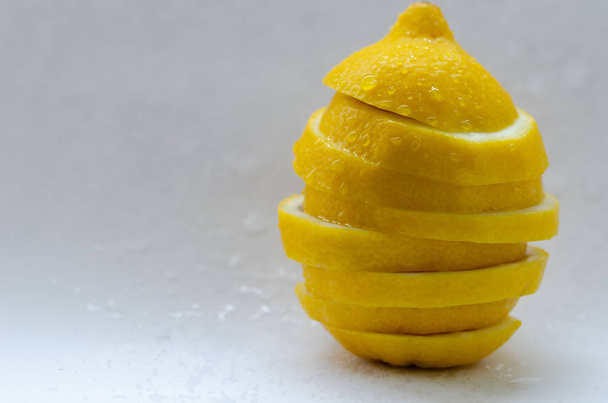Sliced lemon isolated on white background. - Photo, Image