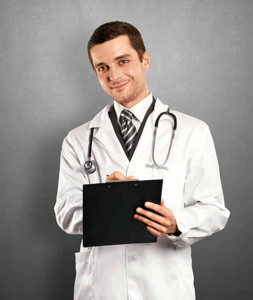 arts man met Klembord - Foto, afbeelding