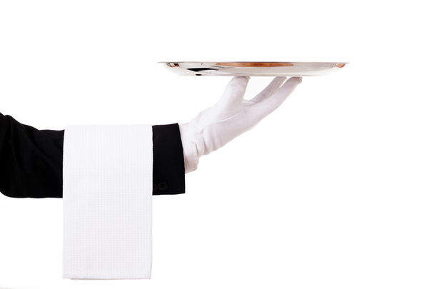 Professional waiter holding an empty dish. Isolated on white bac - Фото, изображение