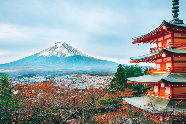 Mount Fuji and Chureito Pagoda at sunrise in autumn, Japan. The Pagoda is in Arakura Sengen Shrine where tourist can see Mt Fuji from panoramic view, one of the most famous view of Fuji Mountain. - Photo, Image