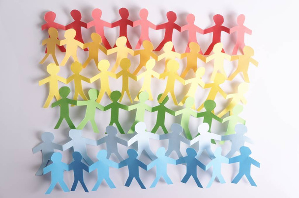 Paper people in LGBT rainbow colors - Фото, изображение