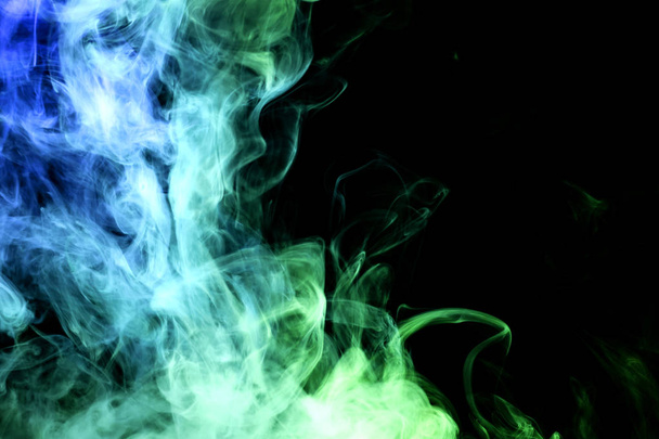 Green and blue smoke on black backgroun - Photo, Image