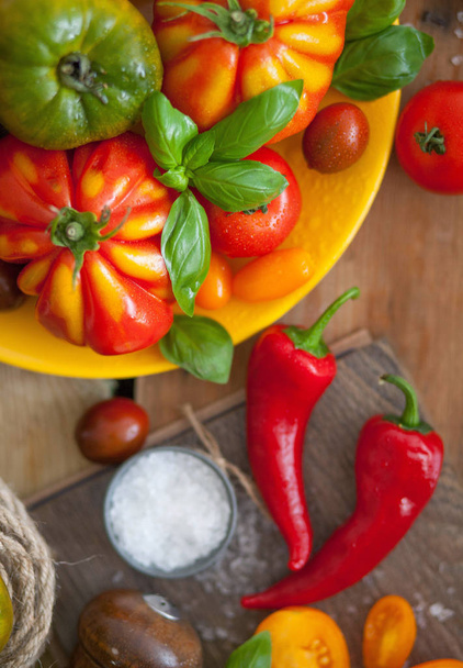 fresh basil and tomatoes on table - Photo, image