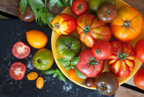 fresh basil and tomatoes on table - Zdjęcie, obraz
