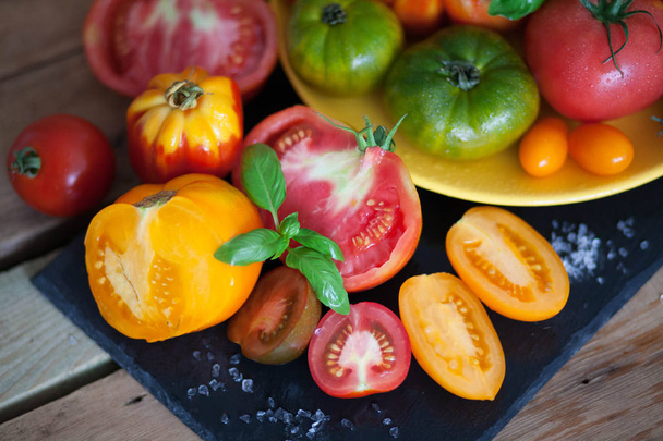 fresh basil and tomatoes on table - Photo, image