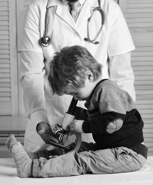 Childhood, science and medical education concept. Boy does experiments - Foto, Imagem