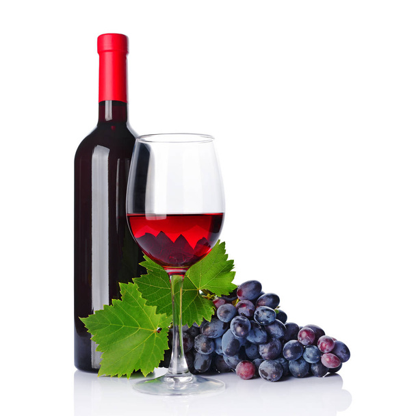Red wine bottle and glass for tasting with fresh grape isolated on white background - Foto, afbeelding