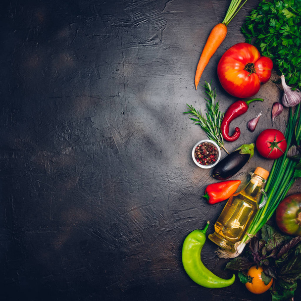Raw organic vegetables with fresh ingredients for healthily cooking on vintage background, top view, banner. Vegan or diet food concept. Background layout with free text space. - Fotó, kép