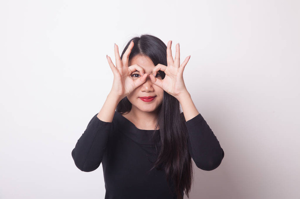 Asian woman do funny  double OK sign as glasses on white background - Φωτογραφία, εικόνα