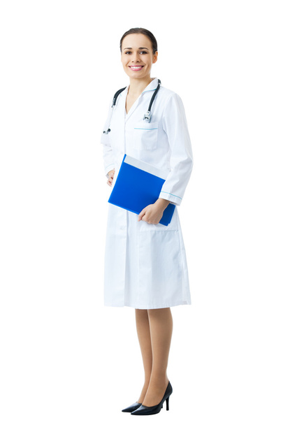 Full body portrait of female doctor or nurse with blue folder, i - 写真・画像
