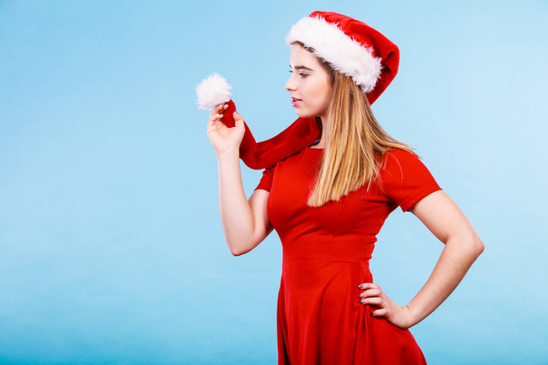 Xmas, seasonal clothing, winter christmas concept. Happy woman wearing Santa Claus helper costume - Φωτογραφία, εικόνα